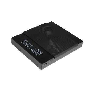 Black electronic device with digital display on a white background