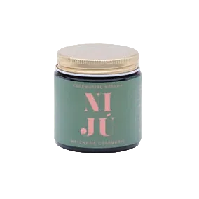 A jar of Niju matcha green tea powder shown next to a circular graphic detailing its characteristics, including usage, grade, umami, color, harvest stage, and aroma.
