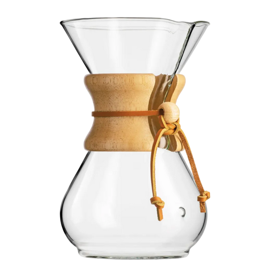 Clear glass coffee maker with wooden collar on a white background