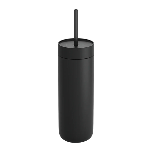 Black tumbler with a straw on a white background