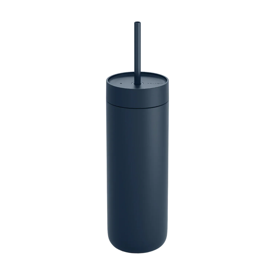 Black tumbler with a straw on a white background