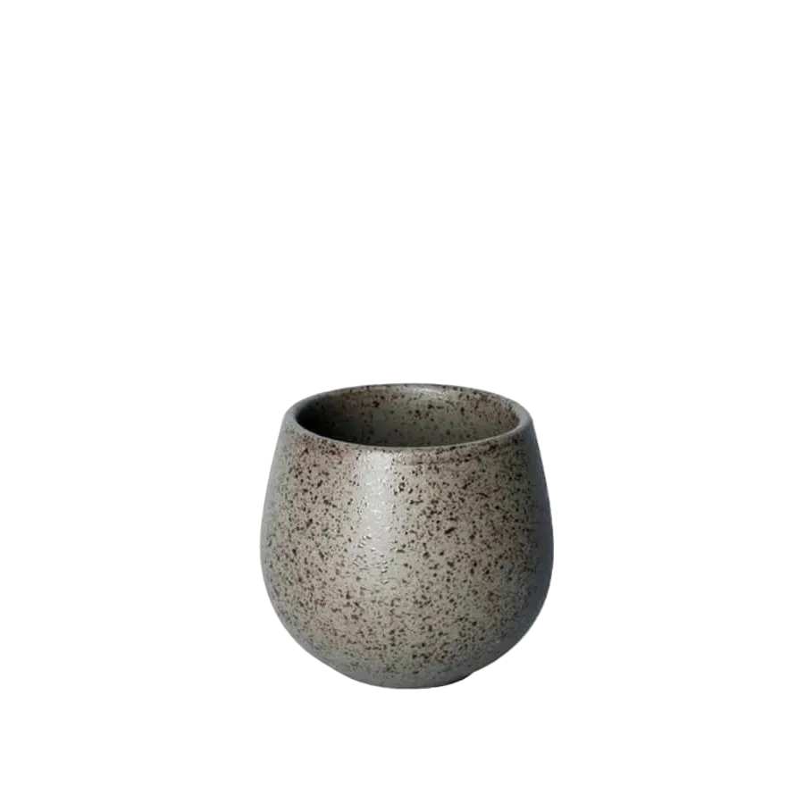 A small ceramic cup with a rounded, bulbous shape and a speckled gray-brown glaze, shown against a plain white background.