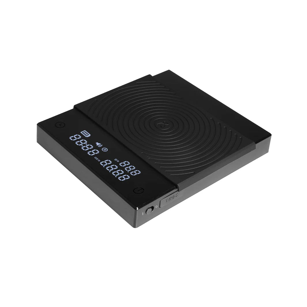 Black electronic device with digital display on a white background