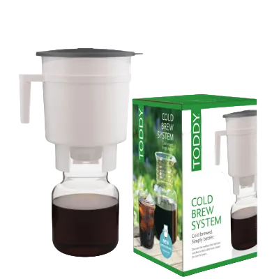 Cold brew system with a glass container and a box labeled 'Toddy Cold Brew System' on a white background.